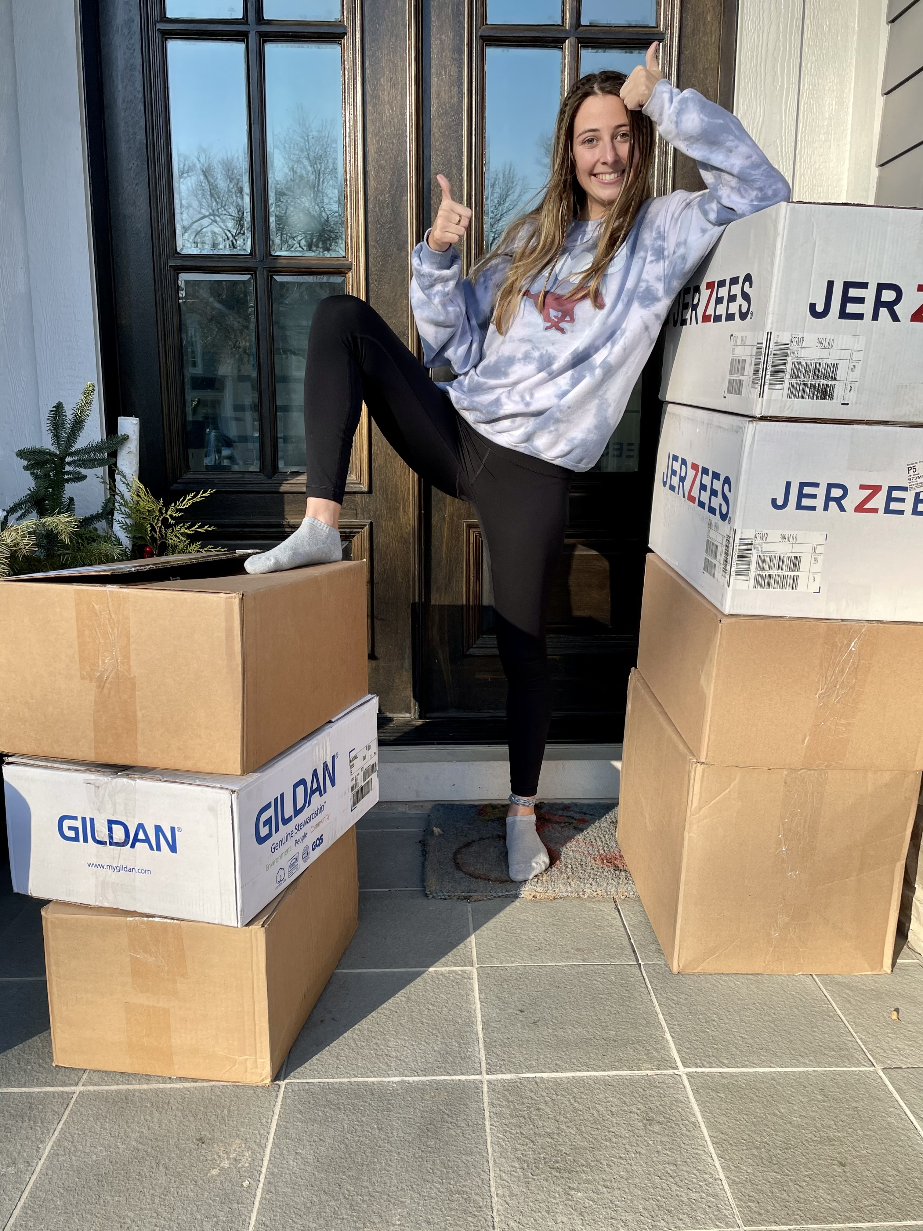 Gabbie with her Etsy crewneck orders